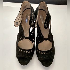 Jennifer Lopez black velvet triangle patterned high heels.